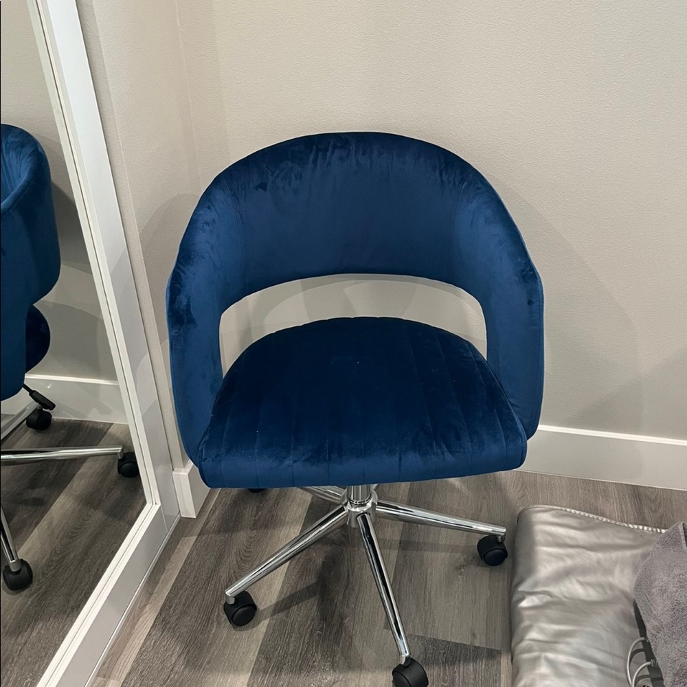 Only sat in a few times velvet blue desk chair
